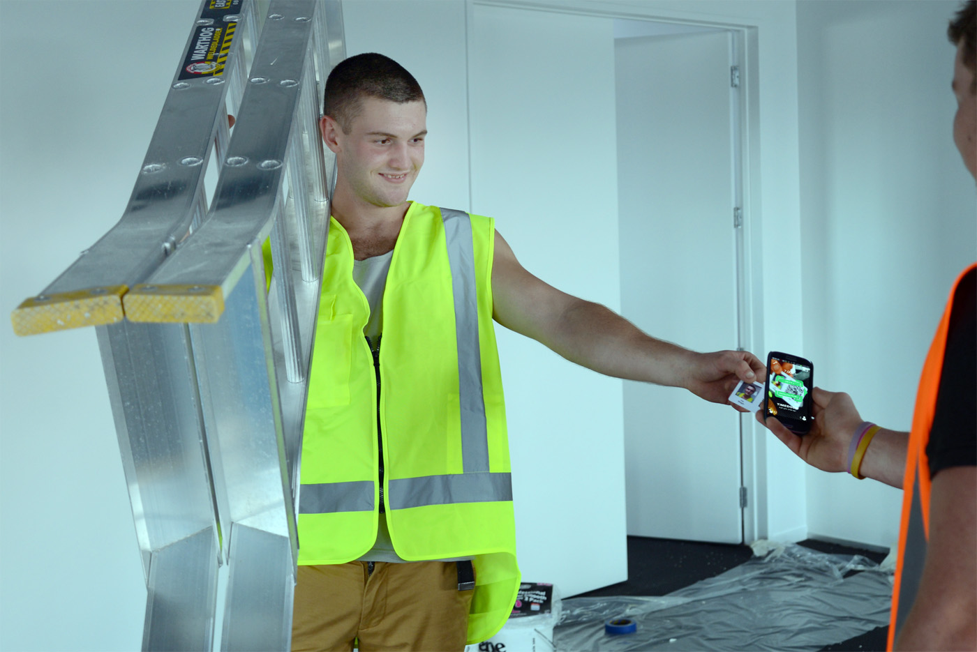 Clocking in on a construction site with TimeDock QR Code time tracking